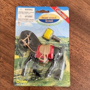 Boley derby stable black horse and brush